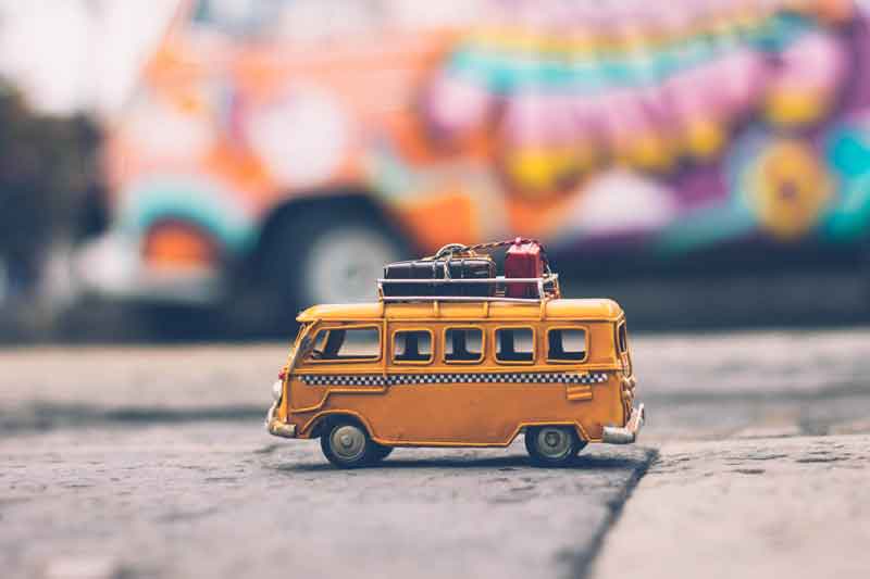 a yellow color toy bus